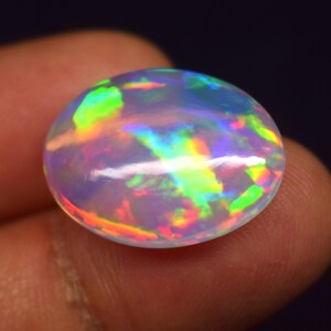AAA++ Top Quality Natural Ethiopian Opal Cabochon Multi Fire Opal Gemstone Fire Opal Cabochon Oval Shape For Making Jewelry .