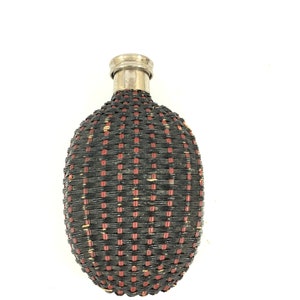 Vintage Perfume bottle with cane cover
