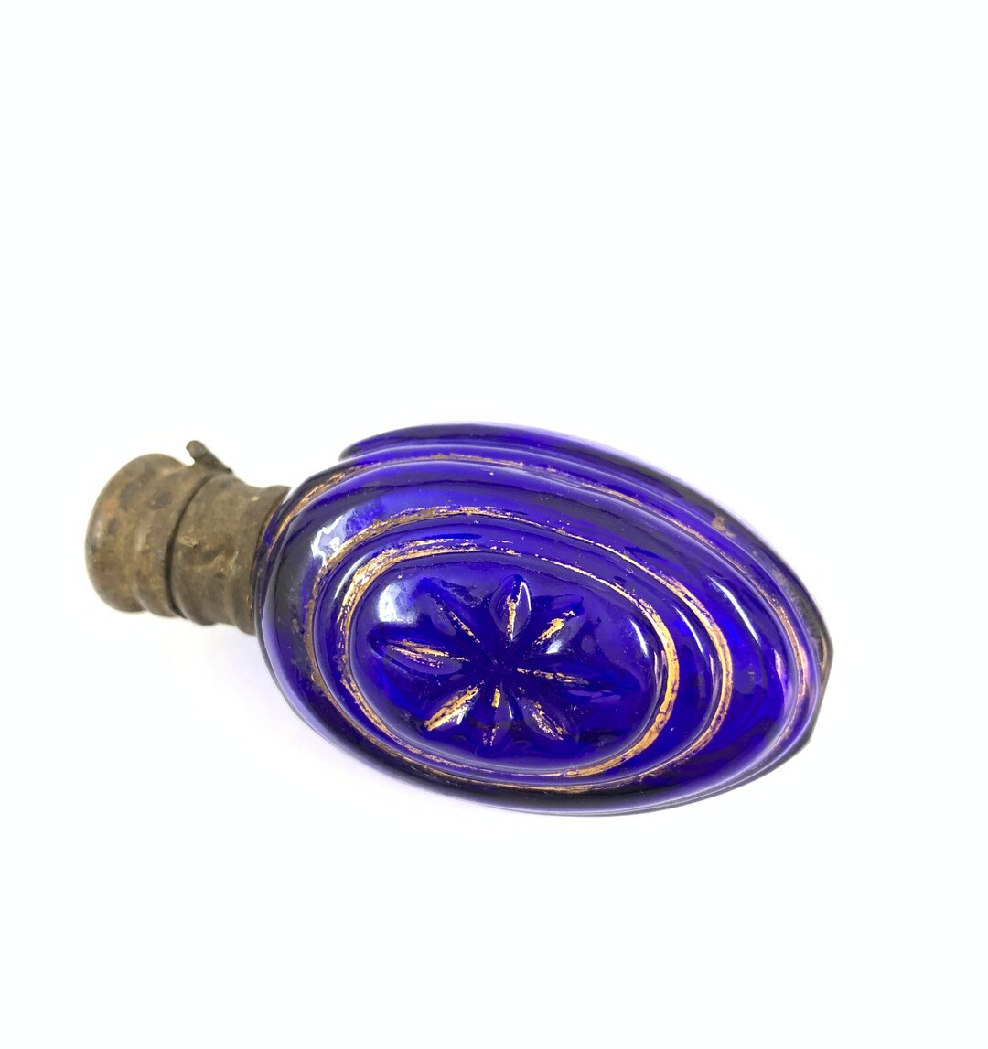 ヴィンテージの卵型ガラス製青い香水瓶（金細工入り） - Etsy 日本