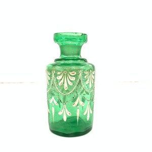 Vintage green glass perfume bottle with enamel and gold work