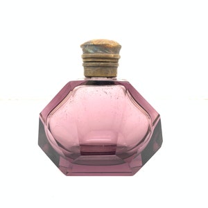 Vintage purple glass perfume bottle