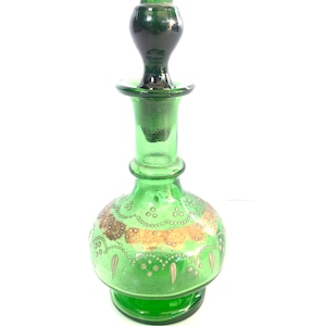 antique green glass perfume bottle with gold work| vintage perfume bottle with lid