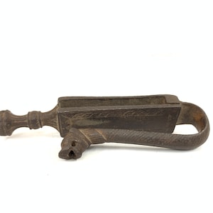 Antique Iron belt hook for gunpowder flask with Lions Face