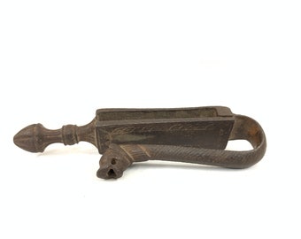 Antique Iron belt hook for gunpowder flask with Lions Face