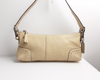 cream color coach purse