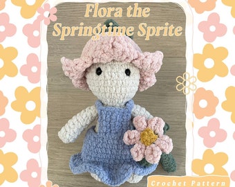 Può includere: Schema a uncinetto per Flora la Fata di Primavera, una bambola all'uncinetto con un cappello di fiore rosa, un vestito blu e un fiore rosa in mano. Lo schema è in formato PDF ed è scritto in inglese.