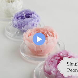 May include: Four simple peony candles in white, lavender, pink, and magenta. The candles are arranged in a row on clear glass bases. The text "Simple Peony" is visible in the lower right corner of the image.