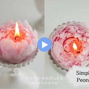 May include: A pink peony-shaped candle with a lit wick. The candle is on a white pedestal. The text "FUNCANDLES NO.274" is visible below the candle.