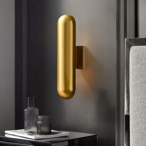 Mid Century Modern Pill Shape Wall Sconce with Integrated LED's - Brutalist, Minimalist Theme in Gold and Black