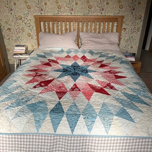 The Blue and Red Star Quilt image 1