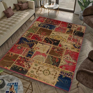 May include: A multi-coloured patchwork rug with a beige background and red, blue, and brown accents. The rug features a variety of patterns and designs, including floral motifs and geometric shapes.
