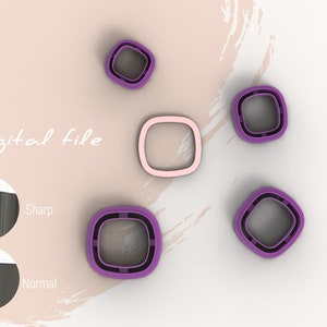 May include: Five cookie cutters in the shape of rounded squares. Four are purple with a darker purple inner ring. One is pink with a darker pink inner ring. The cutters are on a white background with a pink and white brushstroke pattern.