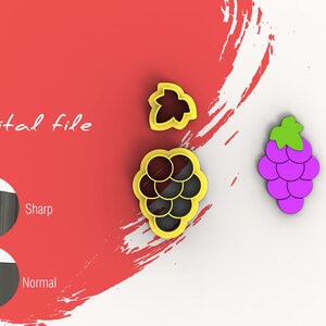 May include: A digital file for a cookie cutter set featuring a grape design. The set includes a grape cluster, a single grape, and a leaf. The cookie cutters are yellow with black outlines. The image also shows a purple grape cluster cookie.