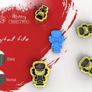 May include: Digital file for a nutcracker cookie cutter. The image shows four nutcracker cookie cutters in different colours, including yellow, blue, and black. The text "Merry Christmas" and "Digital file" are also visible in the image.