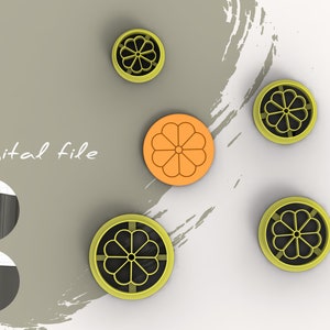 May include: Five cookie cutters, four are yellow with a black flower design and one is orange with an orange flower design.  The cutters are on a white background with a gray brushstroke design.