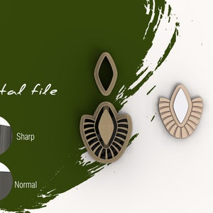May include: A pair of earrings with a geometric design. The earrings are made of wood and have a black and white color scheme. The earrings are shown on a white background.