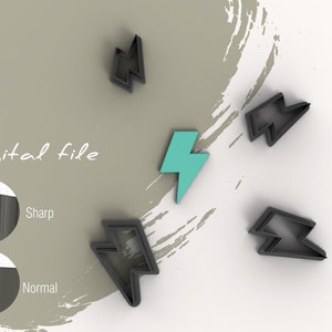 May include: Five cookie cutters in the shape of a lightning bolt. Four are black and one is teal blue. The cookie cutters are on a white surface with a gray background. The text "Digital file" is visible in the image.