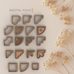 May include: A selection of light brown decorative corner designs, featuring floral, geometric, and curved shapes. The image includes the text "DIGITAL FILES". The designs are suitable for digital use.