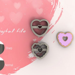May include: Three heart-shaped cookie cutters, two with a ribbon design and one with a hole in the center. The cutters are gray and the background is pink with hearts.