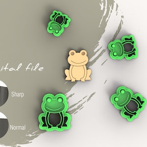 May include: Digital file for a cookie cutter set featuring five frog designs. The set includes a large frog with a simple design, two smaller frogs with a more detailed design, and two smaller frogs with a simple design. The file is available in both sharp and normal versions.