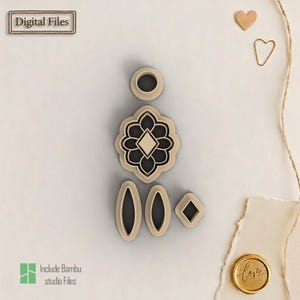 May include: A selection of beige polymer clay cutters in different shapes: a circle, a floral design with a diamond centre, two ovals, and a diamond. The text "Digital Files" and "Include Bambu studio Files" are visible.