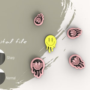 May include: Five cookie cutters in different shapes. Two are yellow and black with a smiley face and lightning bolts. Three are pink and black with a flame design. The text "Digital file" is visible in the image.
