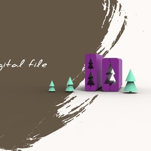 Può includere: Testo "Digital file" su uno sfondo marrone con un tratto di pennello bianco. Tre piccoli alberi di Natale blu turchese sono su una superficie bianca. Due blocchi viola con ritagli di alberi di Natale sono al centro dell'immagine.