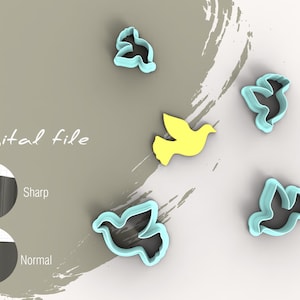 May include: A set of five cookie cutters shaped like doves. Four of the cutters are light blue and one is yellow. The cutters are arranged on a white surface with a grey background. The text "Digital file" is visible in the image.