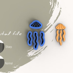 May include: Two blue cookie cutters shaped like jellyfish, one with a bell and tentacles, the other with just tentacles. A single orange cookie cutter shaped like a jellyfish with a bell and tentacles.