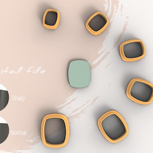 Può includere: Un set di sette tagliabiscotti rettangolari dorati su uno sfondo grigio chiaro. I tagliabiscotti sono disposti in cerchio attorno a un oggetto rettangolare verde chiaro. Il testo "File digitale" è scritto in nero sullo sfondo.