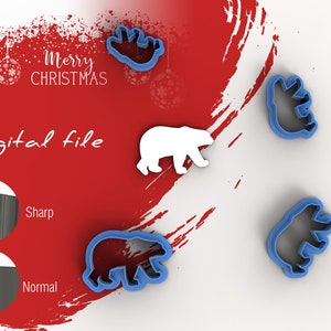 May include: A set of four blue plastic cookie cutters shaped like polar bears. The cutters are on a white surface with a red background. The text "Merry Christmas" and "Digital file" are visible in the background.