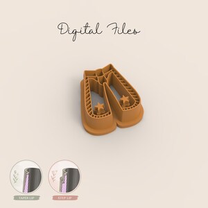 May include: A tan-colored cookie cutter in the shape of ballet slippers with star cutouts. The words "Digital Files" are written in cursive at the top. Two smaller circular images show the taper lip and step lip details.