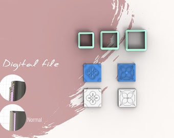 Puede incluir: Archivo digital descargable para un conjunto de cortadores de galletas imprimibles en 3D. Los cortadores tienen forma de cuadrados con un diseño floral. La imagen muestra los cortadores en azul y blanco.
