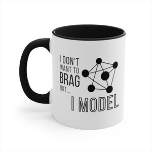 May include: White ceramic coffee mug with a black rim and handle. The mug features a black graphic of a network diagram with the text "I don't want to brag but... I model".
