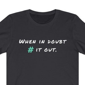 May include: Black t-shirt with white text that reads "WHEN IN DOUBT # IT OUT."