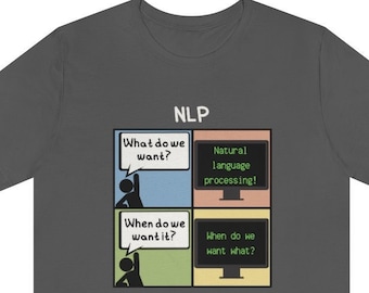 May include: Dark grey t-shirt with the word "NLP" at the top. The shirt features a four-panel graphic with speech bubbles and computer screens. The text on the shirt includes "What do we want?", "When do we want it?", "Natural language processing!", and "When do we want what?"