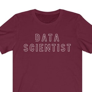 May include: Burgundy short-sleeved t-shirt with the text "DATA SCIENTIST" in white outlined letters.