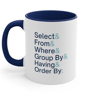 May include: White ceramic coffee mug with a navy blue rim and handle. The mug features the text "Select & From & Where & Group By & Having & Order By;" in blue and teal.