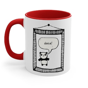 May include: White ceramic mug with a red rim. The mug features a black and white illustration of a panda bear inside a picture frame. The panda is saying "data!" in a speech bubble.