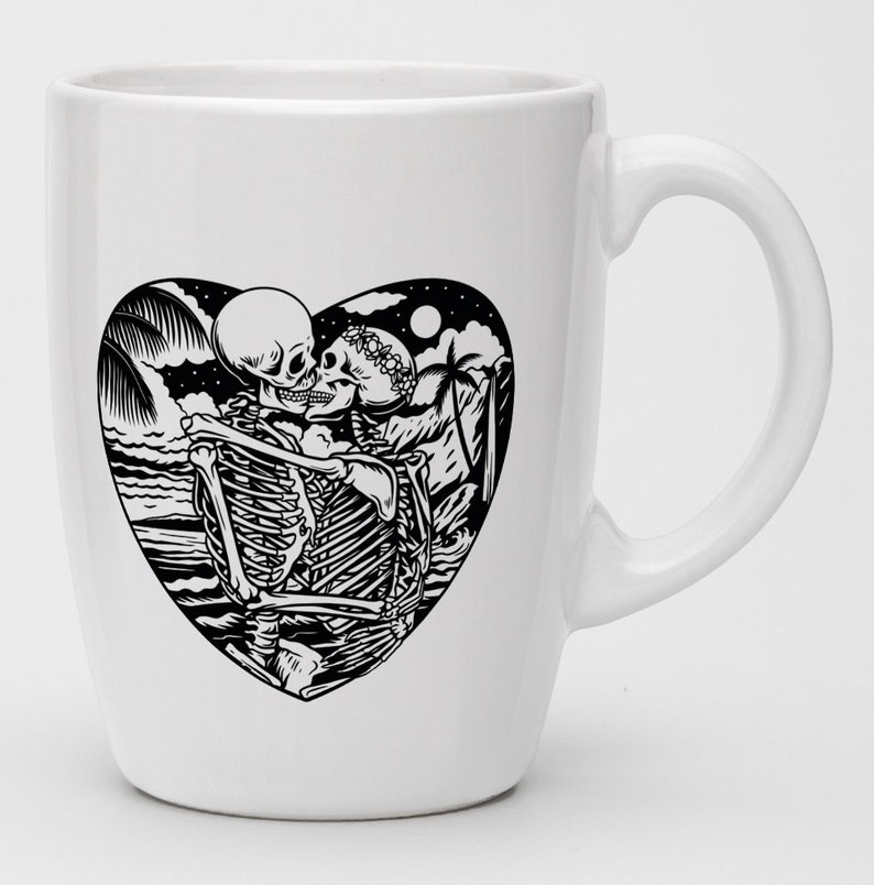 May include: White ceramic mug with a black and white illustration of two skeletons embracing in a heart shape. The skeletons are wearing floral crowns and are surrounded by palm trees and waves.