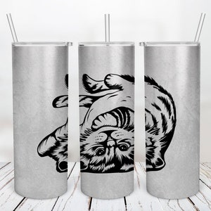 May include: Three stainless steel tumblers with a black and white graphic of a cat curled up on its back. The tumblers are silver with a brushed finish.