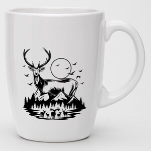 May include: White ceramic mug with a black silhouette of a deer standing on a mountain with a full moon in the background. There are smaller deer in the foreground.