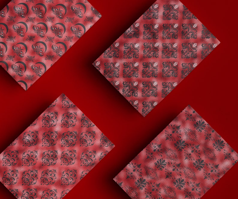 May include: Four red squares with different black and white patterned designs. The patterns are intricate and include floral and geometric motifs.