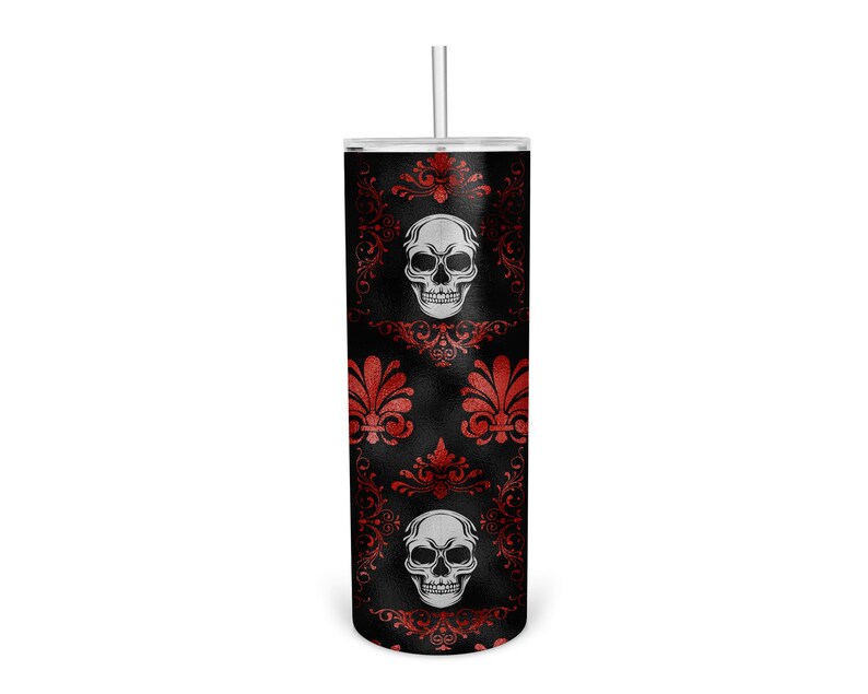 May include: A black and red tumbler with a skull and floral pattern. The tumbler has a clear lid and a straw.