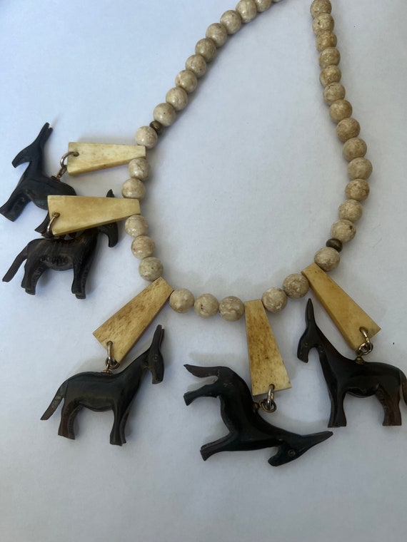Vintage bone & wood carved animal necklace