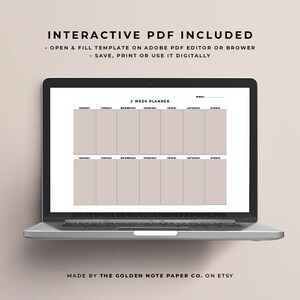 May include: A laptop screen displaying a printable two-week planner template. The planner is divided into days of the week, with space for writing tasks and appointments. The text "INTERACTIVE PDF INCLUDED" and "MADE BY THE GOLDEN NOTE PAPER CO. ON ETSY" is visible on the screen.