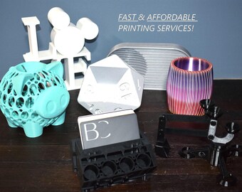 May include: A collection of 3D-printed objects, including a teal piggy bank, a white "LOVE" sign, a white Mickey Mouse head, a large white die, a striped purple and red cup, and a black business card holder. The image also includes the text "FAST & AFFORDABLE PRINTING SERVICES!"