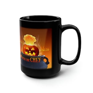 May include: Black ceramic mug with a Halloween-themed design. The mug features a jack-o'-lantern with a chef's hat, inside a cauldron with the text "Don't Mess With The Chef".