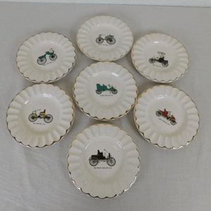 Lot of 7 Porcelain Antique Car Display Plates Gold Trim Ashtray 6 inch diameter