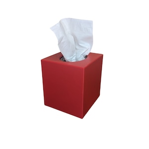 May include: A red square tissue box dispenser with a white tissue box inside.